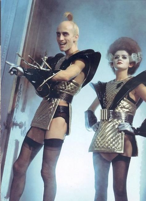 Richard O’Brien and Patricia Quinn (Riff Raff and Magenta) in The Rocky Horror Picture Show. Riff Raff: “[laughing with Magenta, cuts off suddenly and turns to her] Hahahahaha—SHUT UP!” Riff Raff, The Rocky Horror Picture Show, Horror Picture Show, Rocky Horror Picture Show, Rocky Horror Picture, Rocky Horror, Lingerie Shop, Picture Show, Rocky