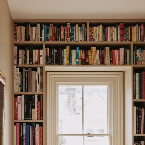 House & Garden Magazine on Instagram: "When Sophie Warburton (@host.home) and her husband set about decorating their London house, colour was the thing that truly transformed it into the tranquil home it is now. The painting which Sophie bought in the first lockdown hangs on the landing, surrounded by more of the couple's impressive book collection. “I gave this chair to my husband for his 30th birthday as he loves to sit and read in chairs in obscure places,” explains Sophie, who chose cushions in ‘Stripes’ by Pierre Frey x India Mahdav. The vase is a ceramic rattan effect design from Host. Follow the link in our profile to tour the London house in full.   📸 @horwoodphoto 🖊 @charlottemccaughan" Painting Bookcase, Window Shelves, Condo Remodel, Home Library Design, London House, Coffee And Books, Stack Of Books, Home Library, Book Nooks