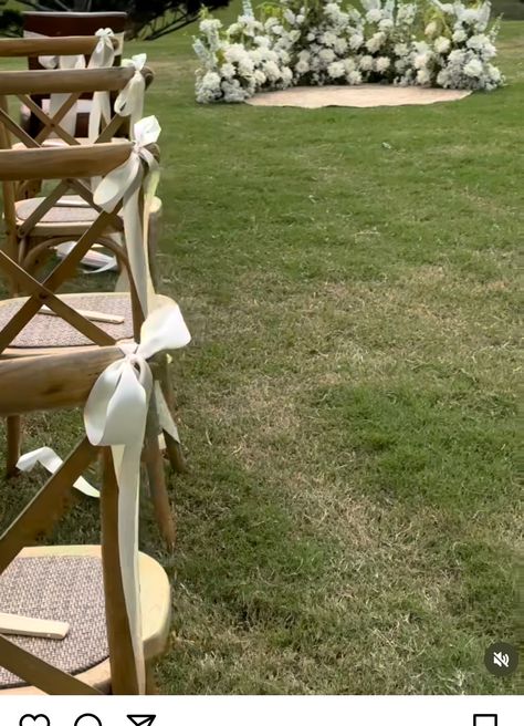 White Chair Bows Wedding, Chairs At Wedding Ceremony, Isle Chair Decorations Wedding, Bow Aisle Markers, Bow On Chair Wedding, Isle Chair Decor Wedding, Aisle Bows For Wedding, White Wedding Chairs Ceremony, Green And White Wedding Ceremony