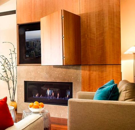 Recessed area for TV over fireplace with "Hidden" doors made from same tile as overall structure.  Not visible when closed. Hide Tv Over Fireplace, Hide Tv, Tv Over Fireplace, Contemporary Family Room, Tv Fireplace, Trendy Door, Modern Tv Cabinet, Tv Ideas, Hidden Tv