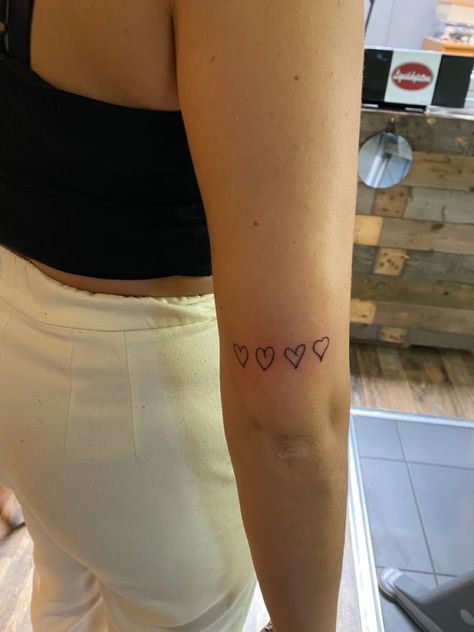 Tattoos From Family Members, Hearts By Family Tattoo, Hearts From Family Tattoo, Four Small Hearts Tattoo, Heart Tattoo On Back Of Arm, Family Simple Tattoo, Back Of Arm Heart Tattoo, Cute Tattoos For Family, Simple Tattoos For Family