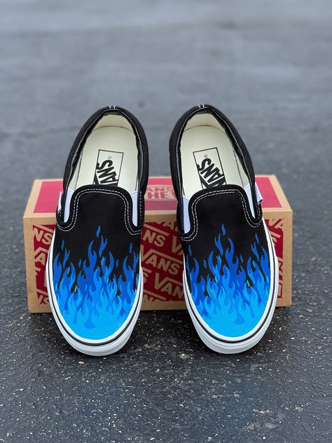 Navy blue, bright blue, neon blue flame fire tip Slip On Vans Shoes. We buy each pair of shoes BRAND NEW. Each pair is made to order, please make sure you put in the correct shoe size before you check out. The ink is permanent and will never come off, fade away, or peel off. Made in the USA. This price includes everything: shoes, artwork, and shipping. Thanks for stopping by our Etsy shop! Please message me with any questions! Because the artwork is custom made for you, there are no exchanges or Painted Shoes For Men, Painted Vans Slip On, Flame Shoes, Leather Drawing, Unique Vans, Shoes Artwork, Spongebob Musical, Shoe Painting, Vans Custom