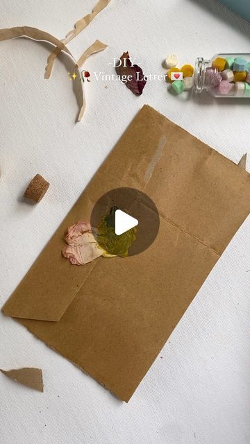 Diksha Rai on Instagram: "Love language- writing letters 💌 Materials used- A4 size crumpled paper Coffee powder mixed with water Old carry bag paper for envelope Dried rose petal & leaf Wax seal . . . . . #diy #love #lovelanguage #art #reelsinstagram #reels #diycrafts #letter #loveletters #creative" Wax Seal Diy, Dry Leaf Art, How To Make Letters, Crumpled Paper, Writing Letters, Dried Rose Petals, Coffee Powder, Dry Leaf, Diy Coffee