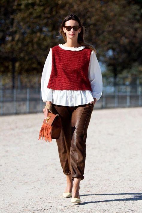 Click for street style inspiration that shows you how to wear bright red all winter How To Style Sweater Vest, Red Vest Outfit, Red Vest, Moda Paris, Paris Fashion Week Street Style, Fall Color, Red Skirts, Cozy Outfit, Red Outfit