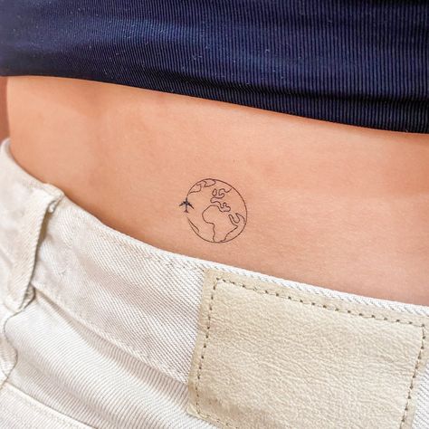 Planet earth temporary tattoo. Set of three. Size: 1 in / 2.4 cm (width) This temporary tattoo is: * Safe & non-toxic * FDA-compliant and fun for all ages * Free shipping in orders over $10! * 20% off when you buy 3 items (+ Free Shipping), code: 3PLUS Temporary Little Tattoos last on average 2-5 days. We suggest placing on oil-free areas where skin does not stretch and keep them clean! Check us out! instagram.com/little.tattoos pinterest.com/littletattoos facebook.com/officiallittletattoos officiallittletattoos.tumblr.com twitter @little_tattoos Wholesale inquiries, custom designs, collaborations or ideas? Email us: ilove [at] littletattoos [dot] com Half World Tattoo, Earth Fine Line Tattoo, Minimalist Earth Tattoo, Minimal Travel Tattoo, Tatoos Travel, Small Earth Tattoo, Australia Tattoo Ideas, World Globe Tattoos, Earth Tattoo Ideas