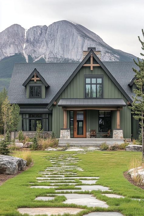 Green Black And Wood House Exterior, Home Built Into Hillside, Light Green Farmhouse Exterior, Exterior Mountain Home Paint Colors, Green Exterior House Colors With Stone, Dark Siding With Wood Accents, Sussex Green Benjamin Moore Exterior, Green And Black Barndominium, Green Blue House Exterior