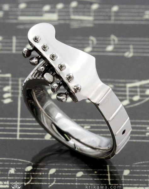 Guitar Ring. This electric guitar ring is perfect for the one that pulls your heart strings. The intricate ring has fret and peg details, with proportions true to the musical instrument. Music Inspired Jewelry, Intricate Ring, Guitar Ring, Guitar Jewelry, Intricate Rings, Edgy Jewelry, Music Jewelry, Style Rock, Heart Strings