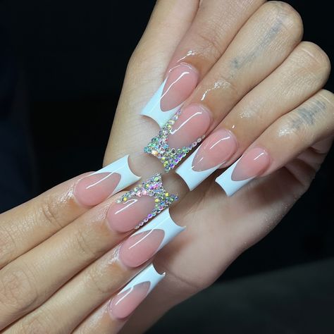 Can never go wrong with some frenchies & some bling 💖 Products used: “Bad N Boujjee” acrylic “045” gel polish all from @vbeautypure #nails #nailtech #acrylicnails #explore #explorepage #frenchnails #blingfrenchies #frenchtipnails Nails Design Ideas Rhinestones, French Tip Nails With Righnstones, French Tip Jewel Nails, White French Tip Nails With Diamonds, French Tip With Gems Rhinestones, French Tips With Bling, French Tip Acrylic Nails With Rhinestone, French Tip Nails With Diamonds, French Tip With Diamonds