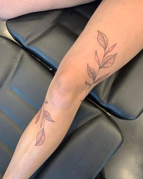 Thigh Leaf Tattoos Women, Wrap Around Tattoos For Women Leg, Wrapping Ankle Tattoo, Sticker Back Tattoos For Women, Knee Tattoo Inspiration, Patchwork Tattoo Quotes, Side Leg Flower Tattoo, Antlers Around Knee Tattoo, Leg Bands Tattoo