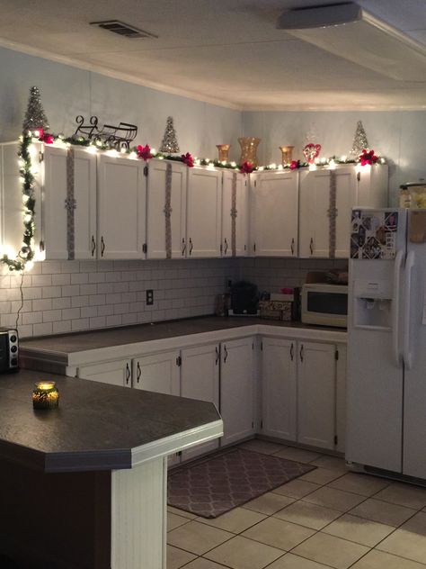 Double Wide Christmas Decor, Christmas Decor Ideas Easy Cheap, Christmas Decor Ideas Above Cabinets, Christmas Decor Ideas Apartment Living Room, Home Decor Holiday, Christmas Decor For Studio Apartment, Christmas Decor Ideas Renter Friendly, Apartment Decorating On A Budget Christmas, Apartment Patio Christmas Decor Ideas