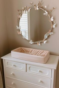 Create a playful yet elegant nursery with our 20+ butterfly-themed nursery ideas. These designs feature moody whimsical nursery themes with colorful wall decor, DIY 3D butterflies, and functional furniture pieces. From forest-themed to enchanted gardens, the nursery ideas come in pink, purple, and neutral colors, complete with rose gold butterflies, ideal for any girly nursery or baby shower. Butterfly And Flower Nursery Theme, Girl Nursery Accessories, Subtle Princess Nursery, Pink And Purple Butterfly Nursery, Nursery Ideas Garden, Butterfly Garden Nursery Theme, Nursery Ideas Butterflies, Butterfly Baby Room Nurseries, Butterfly Themed Nursery Girl