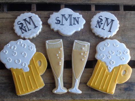 Engagement Party cookies..monograms, champagne and beer mugs Bubbles And Brews Shower Cookies, Brewery Bridal Shower Decorations, Stock The Bar Cookies Decorated, Couple Shower Cookies, Brewery Wedding Shower Ideas, Couples Wedding Shower Cookies, Beer Bridal Shower Ideas, Bubbles And Brews Shower Ideas, Bubbly And Brews Shower Ideas