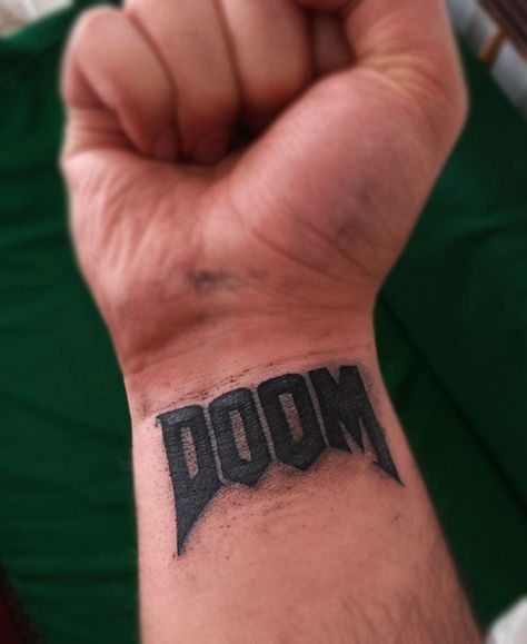 Tat! Doom Symbol Tattoo, Doom Tattoo Game, Dr Doom Tattoo, Doom Tattoo Ideas, Doom Symbol, Mf Doom Tattoo, Doom Tattoo, Fun Trinkets, Eternal Tattoo