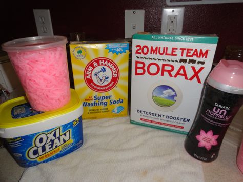 This is my own version of liquid laundry detergent, it smells AMAZING! Cleans great too! Cheap and easy to make! melt 1/2 cup zote bar soap shredded in pot with 2 cups water, once soap is melted lower temp and add 1 cup each of borax, washing soda oxyclean and any scent booster you like, mix well until completely disolved. Pour into 5 gallon bucket and mix with 1 gallon of HOT water, then gradually add in 1 gallon cooler water. Let sit for 5-10 minutes before use. 1 cup per load. Easy! Uses For Borax, Borax Uses, Fels Naptha, Laundry Booster, Laundry Soap Homemade, Powder Laundry Detergent, Laundry Powder, Homemade Laundry Detergent, Homemade Laundry