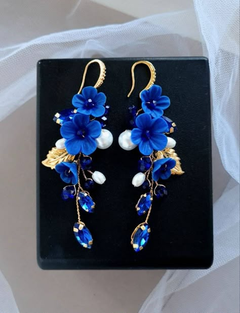 Dark blue earrings are light and ellegant. Earring length about 3 inches. The clasp on the earrings is made of hypoallergenic metal. Dark blue flower earrings consist of ceramic pearls, crystal rhinestones, crystal beads, polymer clay flowers, jewelry wire. * All orders from the Exclusive Wedding Shop you will receive in a FREE beautiful gift box. * Standard shipping: - USA: 12-15 business days - Europe: 3-5 weeks - Canada: 6-10 weeks - Australia: 6-10 weeks - Rest of World: 4-10 weeks * Express shipping UPS: 7-9 business days (around the world). If you have any questions about this product - please contact me. I will be happy to help you. Thank you for visiting my shop.  With best wishes, your Julia Bushmanova 💕 Blue Earrings Wedding, Royal Blue Earrings, Blue Flower Earrings, Ethereal Jewelry, Dark Blue Earrings, Navy Blue Earrings, Quilled Creations, Crystal Earrings Wedding, Anime Jewelry