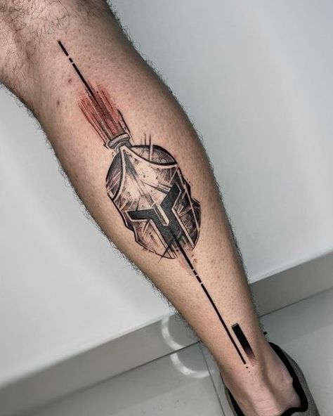 Best 2024 Tattoo Ideas for Men: Sleeve to Small Arm Inspirations Simple Leo Tattoos Men, Simple Spartan Tattoo, Medium Tattoos For Guys, Tatoos Men Hand, Spartan Tattoo Ideas, Tattoo For Leg, Spartan Helmet Tattoo, Sparta Tattoo, Calf Sleeve Tattoo