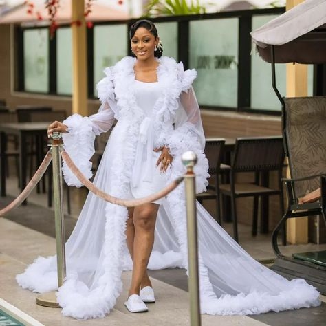 Customized Luxurious bridal robes. #NigerianBridalWear#NaijaWeddingGown#NigerianBridalFashion#NigerianWeddingInspo#NaijaBrideStyle#LagosBrides#AbujaBrides#NigerianWeddingDetails#NigerianBridalLook#NaijaWeddingVibesInternational:#UniqueWeddingGown#ModernBrideStyle#CustomWeddingDress#ElegantBridalGown#ChicBride#DreamWeddingDress#BridalElegance#TimelessBride#WeddingDressGoals#BridalInspoDaily Bridal Robes, Quick Saves