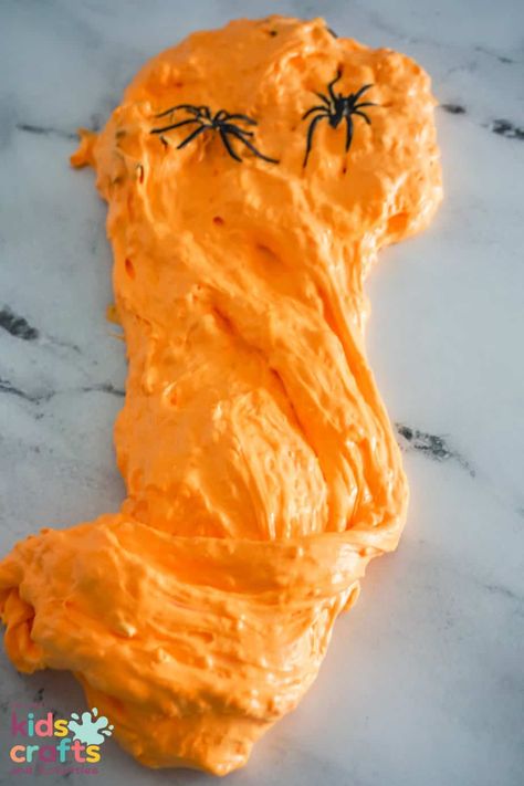 Get in the Halloween mood with this easy to make homemade slime! This Halloween fluffy slime is the perfect themed slime to make for getting into the Halloween spirit and having lots of Halloween fun! This fun slime recipe is a no borax slime recipe making it perfect for kids of all ages to enjoy making and playing with. No Borax Slime, Halloween Slime Recipe, Fluffy Slime Ingredients, Borax Slime Recipe, Fun Slime, Pumpkin Guts, Homemade Slime Recipe, Fluffy Slime Recipe, Halloween Slime