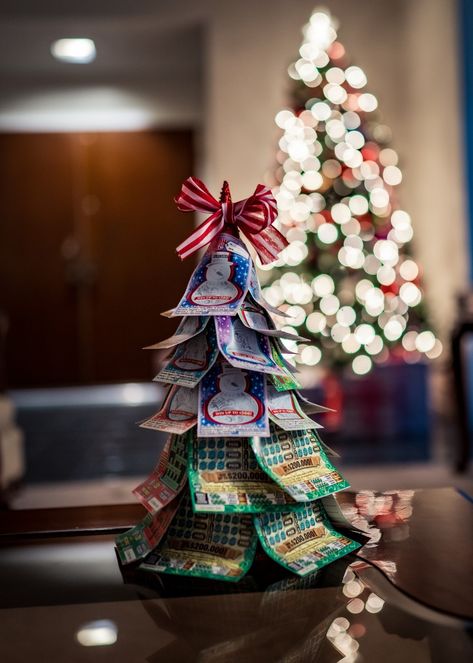 Made this lottery Christmas tree for my dad this past Christmas for his 🎁 Scratcher Christmas Gift Ideas, Christmas Lottery Tree, Lotto Christmas Tree, Christmas Scratcher Gift Ideas, Scratch Ticket Tree, Lottery Ticket Tree Ideas, Lottery Christmas Tree, Scratchers Christmas Gift Ideas, Scratchers Gift Idea