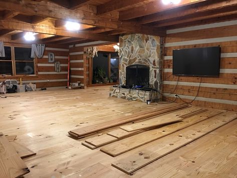 Log cabin home living room renovation with DIY wide plank pine floors. Log Cabin Flooring Ideas, Glass Treehouse, Plank Flooring Diy, Narrow Family Room, Log Cabin Flooring, Log Home Flooring, Best Wood Flooring, Faux Wood Flooring, Wide Plank Floors