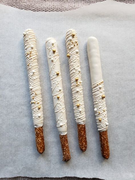 White Pretzel Rods, Gold And White Pretzel Rods, White And Gold Chocolate Pretzels, Chocolate Covered Pretzels For Wedding, Wedding Pretzel Sticks, Chocolate Covered Pretzel Rods Wedding, Choco Covered Pretzels, Wedding Shower Pretzel Rods, White Chocolate Dipped Pretzels