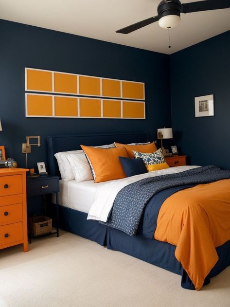 Create a bold and stylish bedroom for boys by painting one wall in a deep navy color. Complement the accent wall with a modern industrial-inspired bed frame and add pops of orange or yellow through throw pillows and decor for a vibrant touch. Orange Boys Bedroom, Boys Bedroom Orange, Orange Boys Rooms, Navy Accent Wall, Bedroom For Boys, Navy Accent Walls, Navy And Orange, Bedroom Orange, Big Boy Room