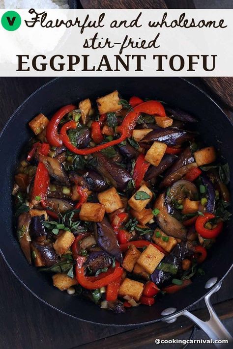 This Eggplant Tofu recipe is a flavorful and wholesome stir-fried dish that is packed with vegetable and perfect for a weeknight dinner. It’s naturally vegan and can be made gluten-free. The dish features crispy tofu and pan-fried eggplants in a spicy, sweet, salty, and savory sauce that is bursting with flavor. It pairs well with Jasmine rice or basmati rice and can be prepared in around 30 minutes, making it a convenient and delicious option for busy evenings. #stirfry #tofu #eggplant #vegan Eggplant Mushroom Stir Fry, Eggplant Tofu Recipe, Eggplant Tofu, Eggplant Vegan, Eggplant Stir Fry, Spicy Eggplant, Veggie Main Dishes, Mushroom Stir Fry, Eggplant Zucchini