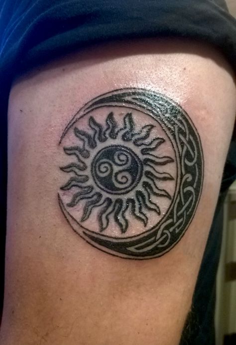 #Celtic Sun and Moon design freshly finished. Upper arm. 9 liner and shader. #Blackworktattoo Celtic Sun And Moon Tattoo, Celtic Sun Tattoo, Celtic Sun And Moon, Star Foot Tattoos, Celtic Sun, Eclipse Tattoo, Full Neck Tattoos, Moon Mushroom, Moon Sun Tattoo