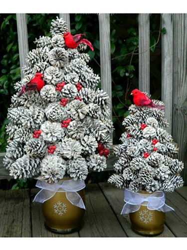 This rustic towering topiary adds understated drama to your winter décor. #pinecones #diy #crafts Pinecone Wedding, Pine Cone Christmas, Pinecone Crafts, Cone Crafts, Cone Christmas Trees, Creative Christmas Trees, Pine Cone Decorations, Cones Crafts, Christmas Decorations Diy Outdoor