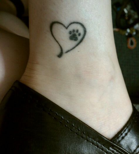 pet memorial tattoo Heart Wrist Tattoo, Pet Memorial Tattoo, Tiny Paw Print, Dog Memorial Tattoos, Pawprint Tattoo, Dog Paw Tattoo, Paw Tattoo, Memorial Tattoo, Memorial Tattoos