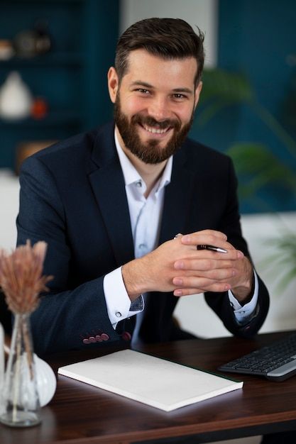 Free photo front view smiley man posing ... | Free Photo #Freepik #freephoto #worker-man #worker #job #career Office Worker Photography, Desk Photoshoot, Profile Photoshoot, Male Office, Linkedin Photo, Office Photography, Job Pictures, Man Posing, Photoshop Training