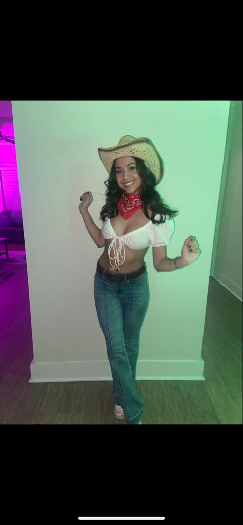 Halloween costume idea, cowgirl! Wearing a white top, flare jeans, red bandana, and cowboy hat! Cowgirl Costumes For Women, Cowgirl Women Costume, Halloween Cowgirl Outfits, Flare Jeans Cowgirl Outfit, Outfits With White Hats For Women, Halloween Costumes With Cowboy Hat, Cute Cowboy Halloween Costume, Cowgirl Bandana Outfit, Womens Cowgirl Costume