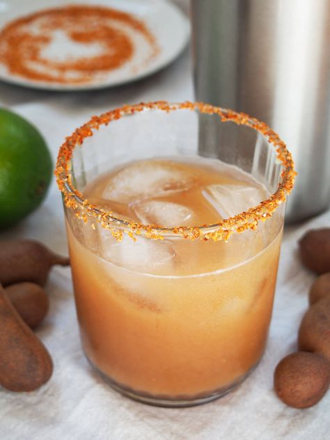 This tamarind margarita gets an extra burst of sweet tart flavor from citrus-like tamarind, that also adds depth to the drink. It's no wonder this is a favorite variation on the classic cocktail. Perfect icy-cold on a warm day. Tamarind Cocktail, Tamarind Margarita, Apple Cider Margarita, Cider Margarita, Tamarind Recipes, Apple Cocktail, Sweet Tart, Classic Cocktail, Sweet Tarts