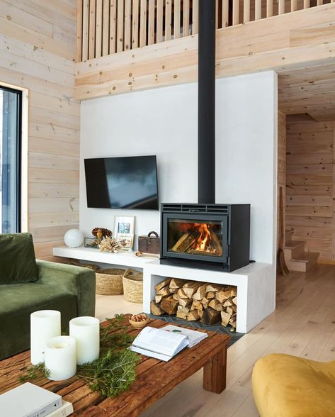 A Relaxed Cottage Interior Inspired By The Idyllic Serenity Of Its Surrounds | Style at Home Tv Next To Wood Stove, Scandi Wood Stove, Off Center Fireplace, Scandinavian Fireplace, Sea Biscuit, Stove Ideas, Tv Fal, Wood Stove Fireplace, Modern Rustic Decor