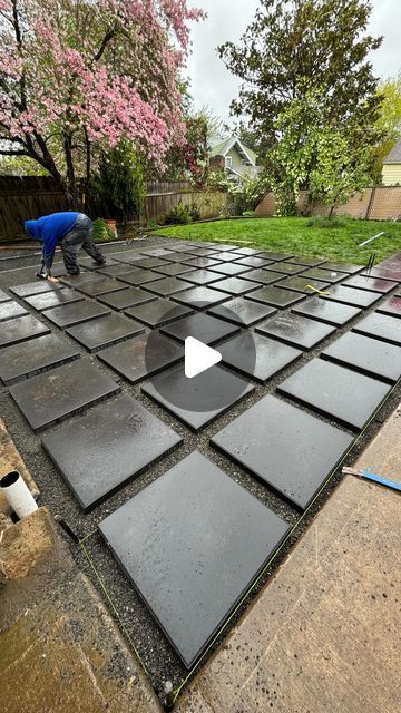 Prestige Landscape & Tree on Instagram: "Pavers going down!⬇️  Who’s ready for the weekend?  #paversdown #paver #largepaver #patio #2x2pavers" Concrete Pavers With Rocks In Between, Pavers And Moss Patio, Rectangular Pavers Walkways, Front Yard Paving Ideas, Small Stones Garden Ideas, Paving And Stones Ideas, Back Porch Paver Ideas, Paved Backyard Ideas Concrete Patios, Backyard Edge Landscaping