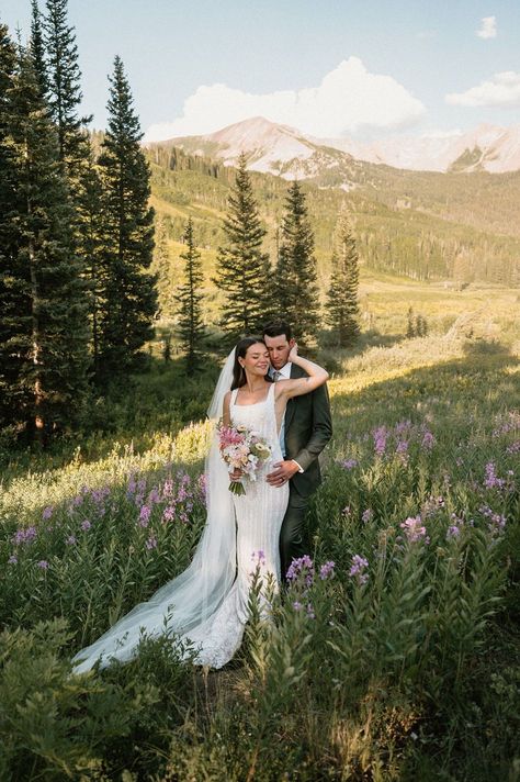 Candid Elopement Photos // Micro Wedding Ideas Colorado // Jessica Luann Photo - We dove headfirst into curating J+T’s charming micro-wedding, set within the wildflowers in the stunning Crested Butte, Colorado. Get inspired with micro wedding venue ideas, wildflower wedding reception, Colorado elopement mountain, and small wedding ideas. Book Jessica for your mountain micro wedding or Colorado elopement photos at jessicaluannphoto.com! Weddings In Colorado, Wildflower Field Elopement, Spring Mountain Wedding Ideas, Micro Wedding Elopement, Chic Mountain Wedding, Intimate Colorado Wedding, Mountain Meadow Wedding, Colorado Outdoor Wedding, Elopement In Mountains