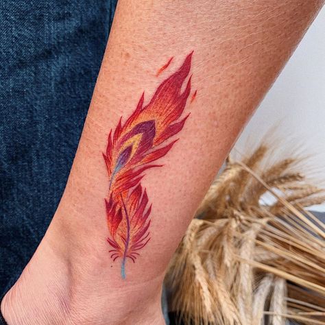 Phoenix Feather Tattoo, Feather Tattoo Ideas, Feather Tat, Owl Feather Tattoos, Phoenix Feather Tattoos, Flute Tattoo, Lisa Tattoo, Rising Phoenix Tattoo, Feather Tattoo Meaning