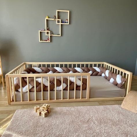 Busywood Climbing Bed Frame 🔆 #MontessoriBed #ChildFurniture #ToddlerRoomDecor #NaturalMaterials #WoodenToys #KidsRoomInspiration #MontessoriHome #EcoFriendlyKids #ToddlerSleep #ParentingIdeas Braided Bumper Floor Bed, Nursery Ideas With Full Size Bed, Floor Crib Bed, Montisorri Baby Floor Bed, Toddler Bed On Floor Ideas, Floor Bed Ideas For Kids, Montessori Bedroom Boy, Full Size Montessori Bed, Toddler Montessori Bedroom