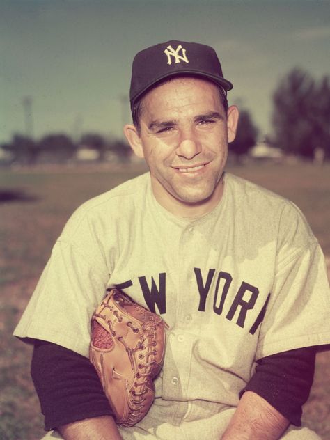 Portrait of American baseball player Yogi Berra in his New York Yankees uniform with a baseball glove under his arm, New York City. (Photo by Hulton Archive/Getty Images) [Via MerlinFTP Drop] Hulton Archive, Getty Images Yogi Berra Quotes, Go Yankees, Baseball Ticket, Yogi Berra, Yankees Fan, New York Yankees Baseball, Yankees Baseball, Sports Hero, Ny Yankees