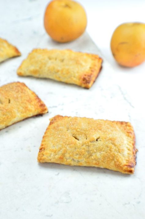 Ginger-Cardamom Asian Pear Hand Pies--These little pies have a warming, aromatic spice from ground ginger and cardamom, and the snappy sweetness of Asian pears for a twist on a classic comfort food. | www.iatethewholething.com