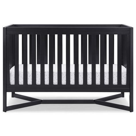 Designed to be the centerpiece of your nursery, the Tribeca 4-in-1 Convertible Crib by Delta Children exudes contemporary cool. Designed to be the centerpiece of your nursery, the Tribeca 4-in-1 Convertible Crib by Delta Children exudes contemporary cool. Featuring plenty of modern touches it boasts a sleek x-shaped base and airy slats Crafted from strong and sturdy wood, this crib features three height levels, and converts to a toddler bed, daybed and full size bed, making it the only bed your Full Size Metal Bed Frame, Black Crib, Baby Cribs Convertible, Toddler Beds, Adjustable Mattress, Buybuy Baby, Baby Nursery Furniture, Delta Children, Toddler Furniture