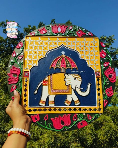 Showcasing the ultimate beauty a set of 2 jharokhas with elephant in between facing each other bordered with beautiful lotus which our client requested taking inspiration from dotilism_maniii. . . DM FOR ORDERS Follow @kraftsbykarnika for more.. Customization available . . [Lippan art, Lippan, Elephant, Jharokha, Lotus, Mirror Art, Mud Art, Wall Decor, Traditional Art, Interior Design, Decor] Lippan Art Jharokha Design, Elephant Lippan Art Design, Lippan Art Elephant Design, Elephant Lippan Art, Jharokha Lippan Art, Lippan Art Square Design, Square Lippan Art, Jharokha Painting, Clay Mirror