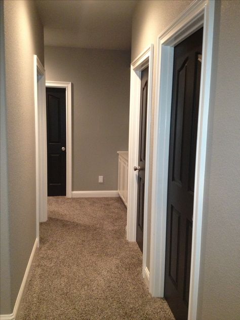 Greige walls and Black doors-- rare to find a photo with carpet.  Seems everyone has wood floors. Greige Walls, Interior Wood Doors, Black Doors, Wood Doors, Best Interior, Hallway, Doors, Carpet, Trim