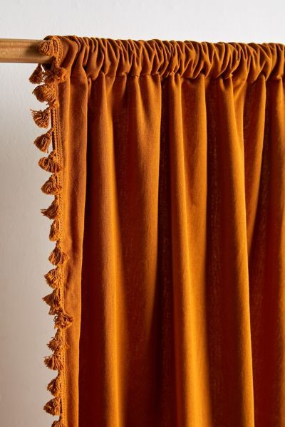 Mini tassel fringe-trimmed window curtain in semi-opaque cotton for keeping your room nice and cool. Comes with one curtain panel. Features Light-filtering window panel Tassel fringe trim for a modern-boho feel Rod pocket for hanging Content + Care Includes one window panel Cotton Hand wash; lay flat to dry Imported Size Dimensions: 52" w x 84" l | Palma Fringe Light Blocking Window Curtain in Honey at Urban Outfitters Autumn Curtains, Mcm Curtains, Terracotta Curtains, Boho Style Interior Design, Burnt Orange Curtains, Fringe Light, Urban Outfitters Curtains, Orange Curtains, Bohemian Aesthetic