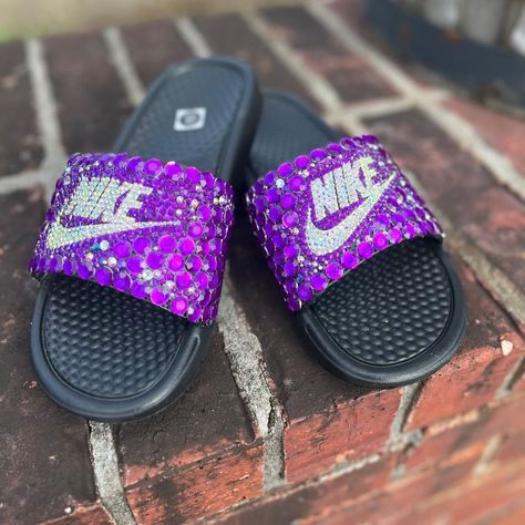 “Step into luxury with our custom bling Nike slides! ✨ Elevate your footwear game with these unique, handcrafted designs. Slide into style and comfort today! #BlingNikeSlides #CustomFootwear #carascollection Nike Slides, Custom Bling, Slides, Nike, Quick Saves, Design