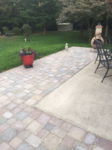 Extending concrete patio with pavers Concrete Patio Paver Border, Paver Extension Patio, Paver Patio Next To Concrete, Patio With Rocks And Pavers, Cement And Paver Patio, Concrete Patio With Paver Extension, Adding Pavers To Side Of Driveway, Extending Back Patio, Concrete And Paver Patio Ideas