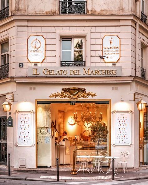 Les facades de Paris on Instagram: "Since 2014, in the district of St Germain des Près Véronica and her husband Renato have been associated with a master Roman ice cream maker. From this meeting was born a tea room and ice cream parlor with a particular style: large touches of gold, antique furniture, crystal, silverware... We are almost in another era! Everything is done on site, in the laboratory. The ice creams are prepared daily from fresh, seasonal produce. The fruits are peeled and seeded Ice Cream Parlor Exterior, French Ice Cream, Paris Architecture, Paris Vibes, Seasonal Produce, Ice Cream Parlor, Window Light, St Germain, In Season Produce