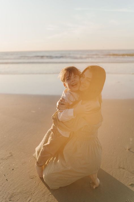 mom and son hugging during sunrise on the beach Mother Son Beach Photoshoot, Mother And Son Beach Photos, Mom And Toddler Beach Photos, Mom And Son Beach Photo Ideas, Mother Son Beach Photos, Unique Beach Photos, Mom And Son Beach Pictures, Soulmate Photos, Mom And Son Photography