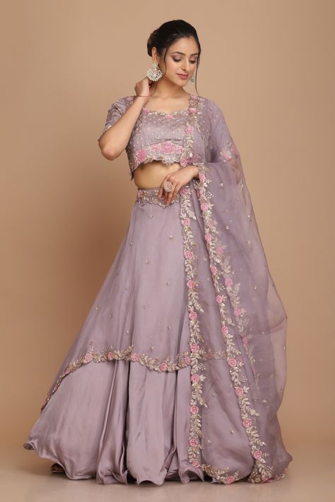 Featured here is a layered lehenga in light mauve colour enhanced with hand embroidery. Layer Lehenga Designs, Hand Embroidery Lehenga Designs, Mauve Lehenga, Layered Lehenga, Mauve Colour, Coordinated Outfits, Light Mauve, Jacket Cape, Saree Gown