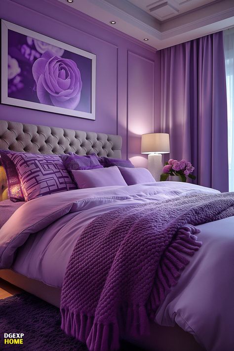 The image captures a modern bedroom with a gentle lavender color scheme. Key features include a comfortably tufted headboard and matching throw blankets, which emphasize comfort and relaxation. The large purple rose artwork enhances the romantic and tranquil feel of the room. Bedroom Colors Purple, Purple Bedroom Design, Cozy Decor Ideas, Lavender Bedroom, Purple Bedroom Decor, Rose Bedroom, Rose Artwork, Cozy Fall Bedroom, Purple Home Decor